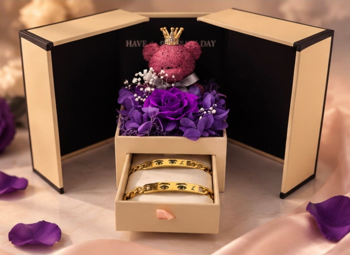 Lila Rosenbox mit personalisierten Augen-Partnerarmbändern